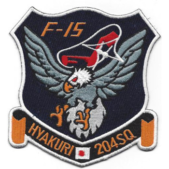 Airlift squadron patch with 204th designation and Hyakuri Air Base colors representing C-130 operations in Japan and the Pacific.