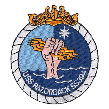 Round USS Razorback SS394 submarine patch with gold dolphins on top, a twisted white line border, and a fist rising from blue waves gripping gold lightning bolts beneath a white eight-pointed star.