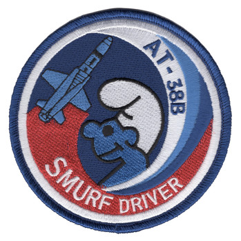 Trainer aircraft patch featuring the T-38 Talon Smurf with distinctive blue and white paint scheme representing advanced pilot training.