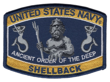 United States Navy Shellback patch with gray King Neptune holding a trident between two mermaids on navy blue, gold bands lettered UNITED STATES NAVY and SHELLBACK, and the words Ancient Order of the Deep.