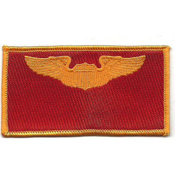Gold and red patch with command pilot wings flanking shield, full command authority insignia.