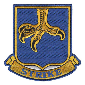 Blue shield patch with a gold eagle's claw coming down from the top, talons spread and tipped in black, above a gold scroll reading STRIKE in blue letters for the 502nd Infantry Regiment.