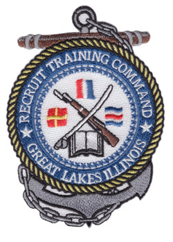 Recruit Training Command Great Lakes Illinois patch with a gray anchor and brown stock behind a rope-ringed blue medallion holding a crossed rifle and cutlass, an open book and three signal flags.