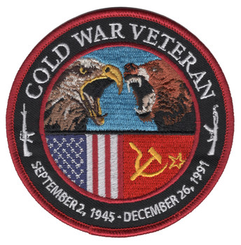 Round Cold War Veteran patch with a bald eagle and a brown bear face to face above the US and Soviet flags, white rifles on each side, the dates September 2, 1945 to December 26, 1991, and a red merrowed border.