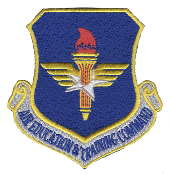 Command patch with Air Education and Training Command insignia featuring educational and training imagery, embroidered in command colors with institutional design.