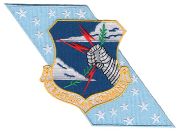 Shield-shaped Strategic Air Command banner patch in blue and white, featuring SAC emblem with strategic insignia and bold lettering.