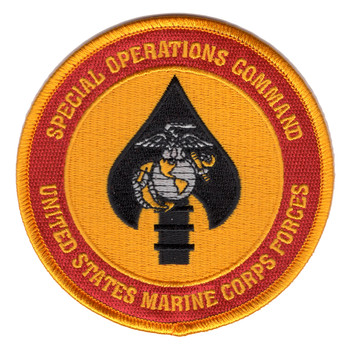 Circular embroidered patch with gold border and red ring, featuring a black spearhead containing the Marine Corps Eagle, Globe, and Anchor, with "SPECIAL OPERATIONS COMMAND" and "UNITED STATES MARINE CORPS" text.
