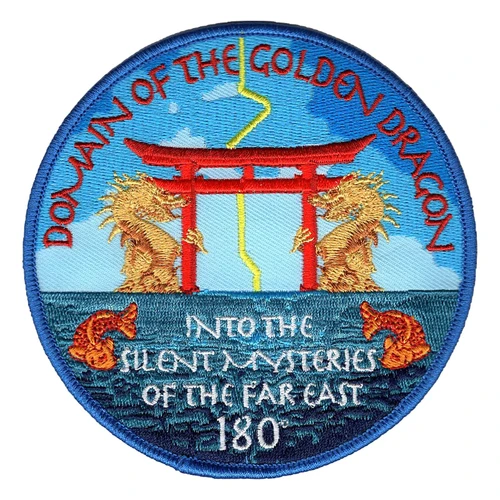 Round Domain of the Golden Dragon patch with two gold dragons beside a red torii gate, a yellow lightning bolt, two orange koi in teal water, the words Into the Silent Mysteries of the Far East and 180 degrees, blue merrowed border.