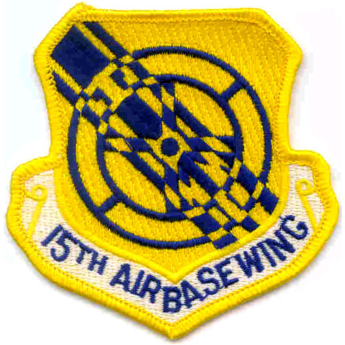 Air base wing patch with 15th designation and Hickam Air Force Base colors representing Pacific operations and logistic support.