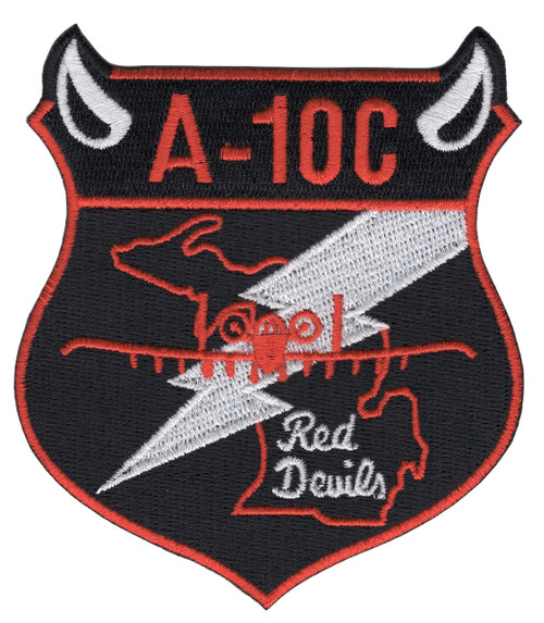 107th Fighter Squadron Red Devils A-10C patch, black shield with devil horns, red A-10 and silver lightning bolt over Michigan state outline, Michigan Air National Guard