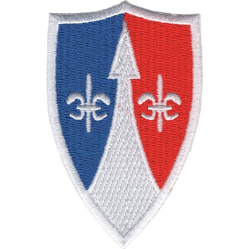 Shield-shaped embroidered patch split vertically in royal blue and red with a white center field; twin fleur-de-lis flank a central upward-pointing white arrow, with a white merrow border.