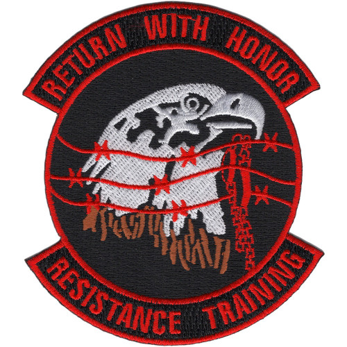 Rectangular patch with bold military imagery and text reading SERE training designation, featuring standard Air Force color scheme of blues and silvers with embroidered borders.