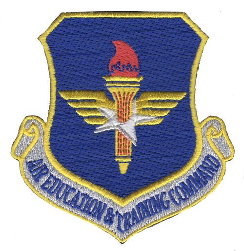 Command patch with Air Education and Training Command insignia featuring educational and training imagery, embroidered in command colors with institutional design.