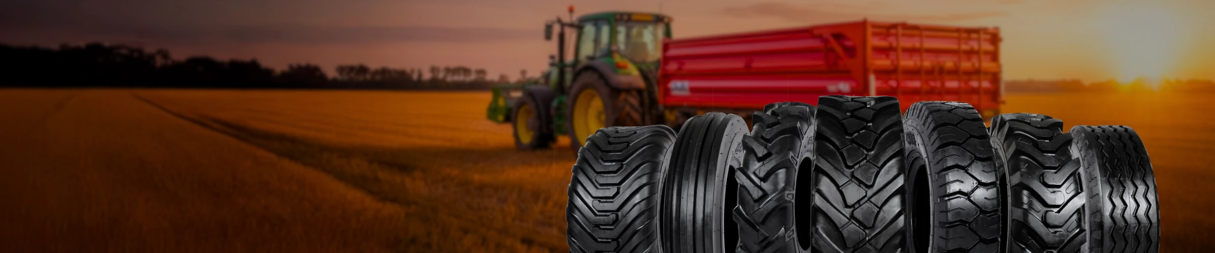 Neumáticos agrícolas ATF junto a maquinaria en el campo