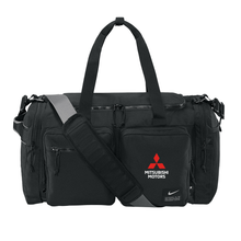Mitsubishi Motors Nike Duffel Bag product image featuring official Mitsubishi Motors branding, detailed construction, and lifestyle-ready automotive accessory design