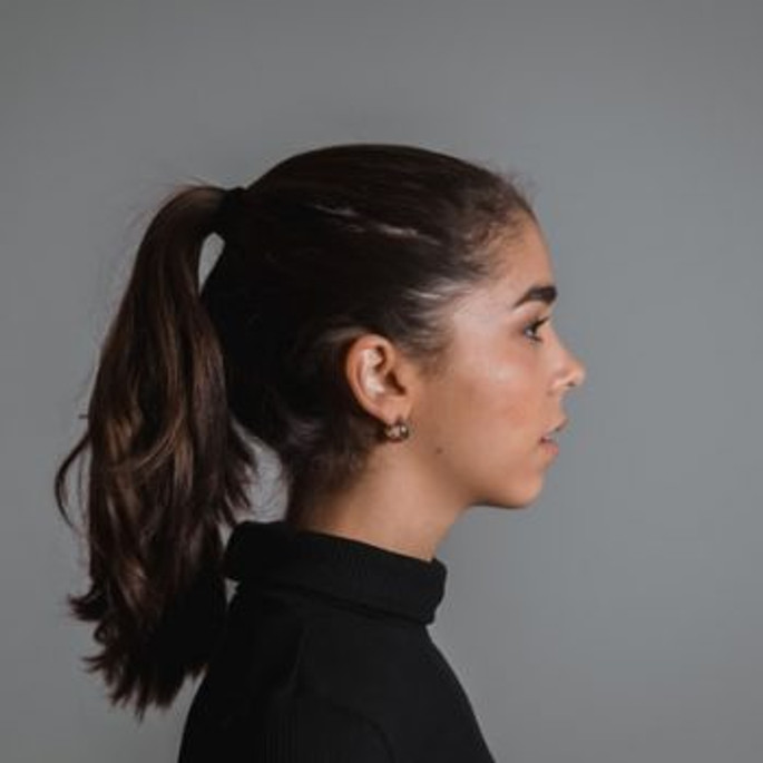 THE STEPS TO SECURING A THICK PONYTAIL WITH EXTENSIONS