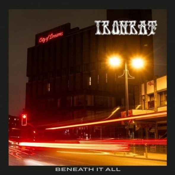 BENEATH IT ALL
