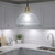 Photograph of LED Golfball Light Bulb Cool White in a Glass Pendant