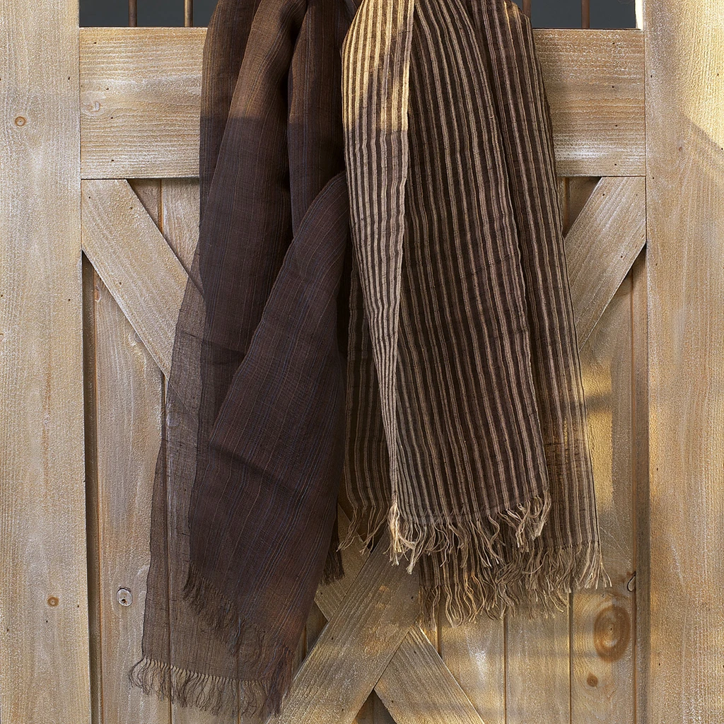 These gossamer silk shawls were designed by Chiaki and Kaori Maki of Japan and handwoven in India.
