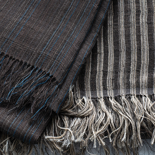 These gossamer silk shawls were designed by Chiaki and Kaori Maki of Japan and handwoven in India.