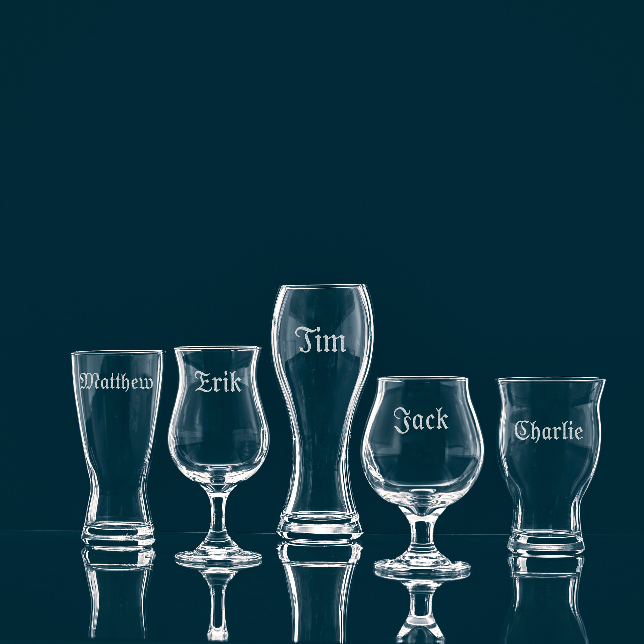https://cdn11.bigcommerce.com/s-b5w84/images/stencil/2048x2048/products/2569/6157/9-11-23_5_beer_glasses-3_names_etched__56529.1698672763.jpg?c=2