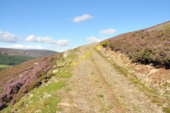 Photo 6"x4" Hill track round The Craig Corgarff c2010