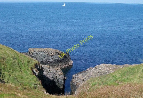 Photo 6"x4" Rocky indentation in the coastline Rhos-y-llan c2010