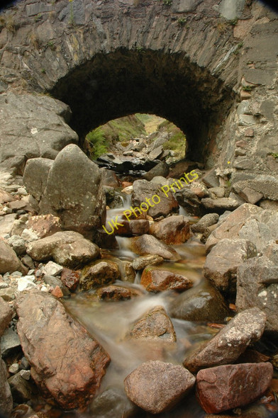 Photo 6"x4" Stream flowing under a bridge on the old Glencoe road Glencoe\/NN1058 c2006
