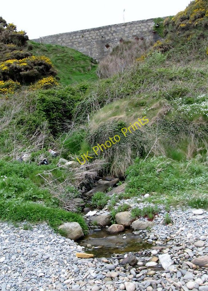 Photo 6"x4" Stream emerging on to the beach from under the A2 at Clash Bridge Ballymartin c2011