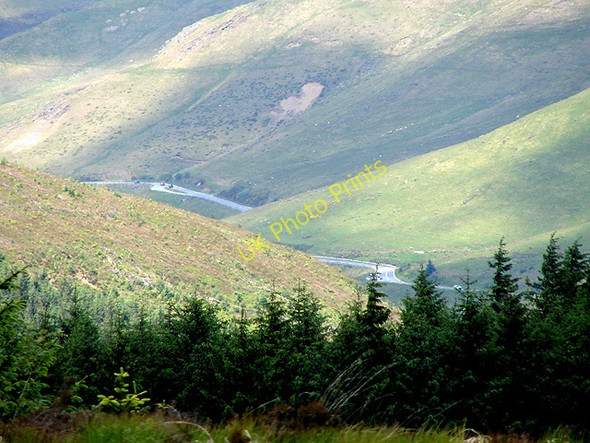 Photo 6"x4" The A44 road running beneath Llechwedd Hirgoed Pont Rhydgaled c2011