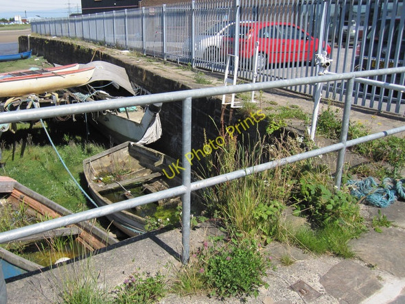 Photo 6"x4" Corner of the old quay and a bench mark Connah's Quay c2011
