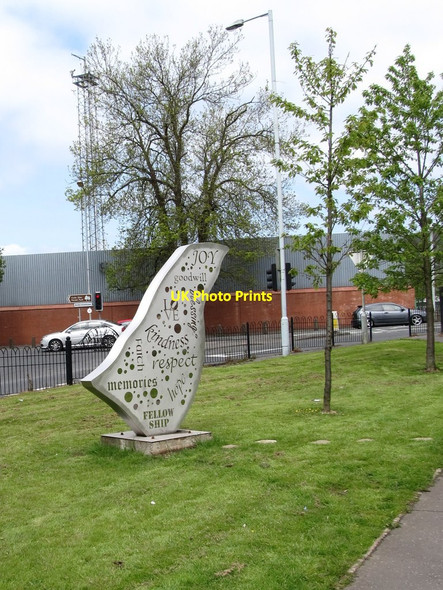 Photo 6"x4" A piece of public art on green land at the junction of Blacks Road and Andersonstown Road Dunmurry c2012
