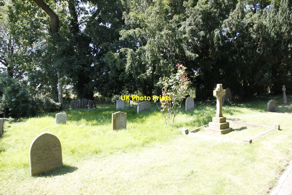Photo 6"x4" Part of the churchyard Eaton Hastings c2012