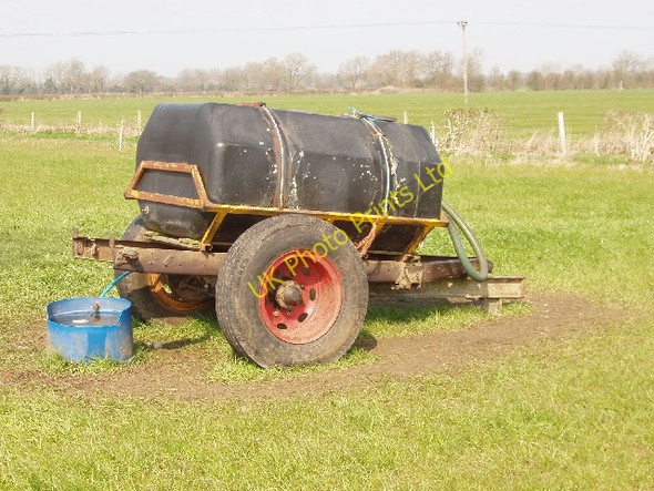Photo 6"x4" Tanker and water trough for sheep Heathfield Village c2007