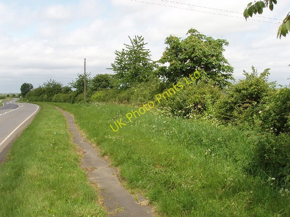 Photo 6"x4" Main road with grass verge and hedge, outside Winslow Addington\/SP7428 c2007