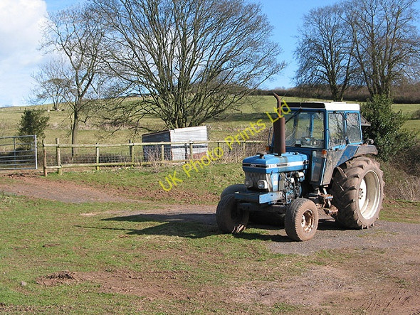 Photo 6"x4" Tractor by a hillside in Welsh Newton Welsh Newton c2008