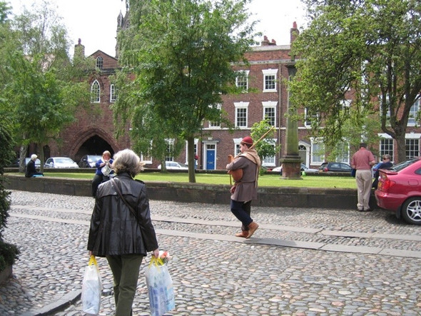 Photo 6"x4" A lone piper in Abbey Square Chester c2008