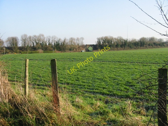 Photo 6"x4" View across a field to railway bridge on Station Road Bossington\/TR2355 c2008