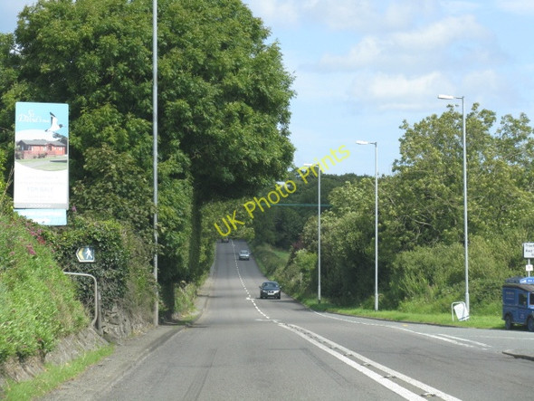 Photo 6"x4" The A5025 Dips Near Red Wharf Bay Llanbedrgoch c2009