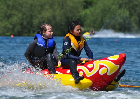 Photo 6"x4" Two girls being towed along by a Jet Ski Bodymoor Heath c2010