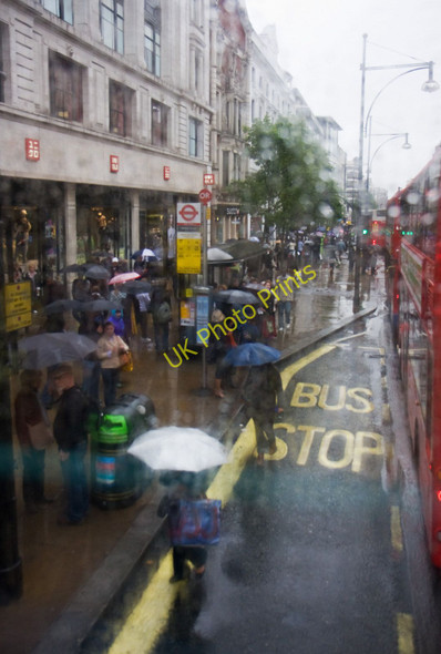 Photo 6"x4" Umbrellas on Oxford Street Westminster c2010