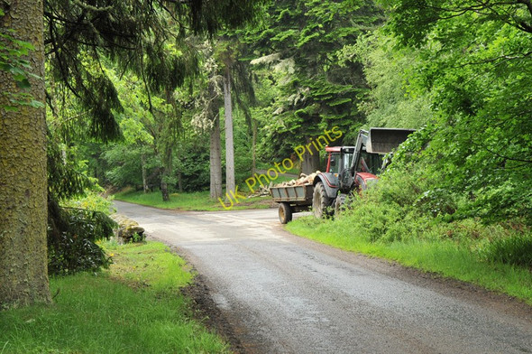 Photo 6"x4" Tractor parked up at the junction near Coulmony House Relugas c2010