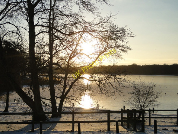 Photo 6"x4" Late afternoon sun reflected on a frozen Rollesby Broad Rollesby c2010