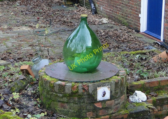 Photo 6"x4" Green bottle in the garden of a burnt-out property Tydd St Giles c2011