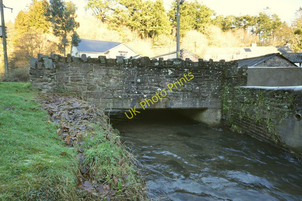 Photo 6"x4" A bridge over Colam Stream on the B3230 at Milltown as seen from downstream Crockers c2011