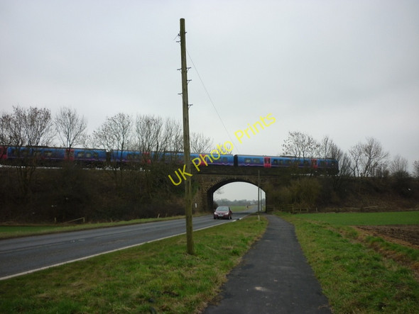 Photo 6"x4" The rail bridge over the A162 Barkston Ash c2011