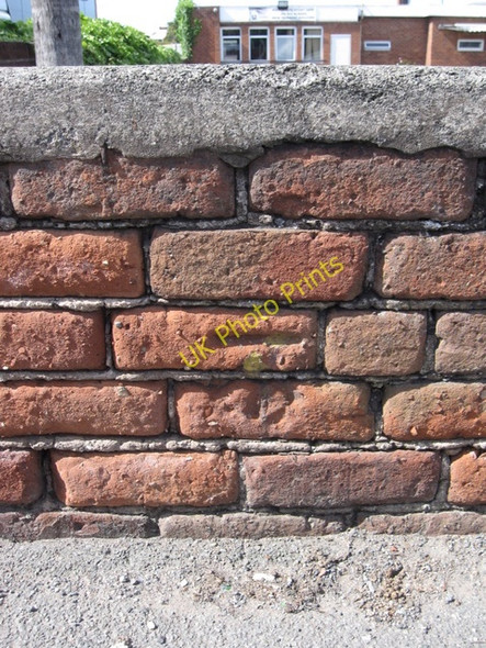 Photo 6"x4" Weathered bench mark on Saltney High Street Saltney c2009