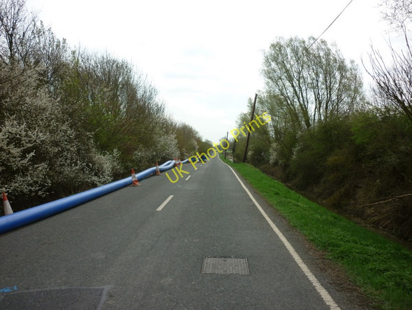 Photo 6"x4" A waterpipe is being laid on Low Levels Bank (road) Sandtoft c2011