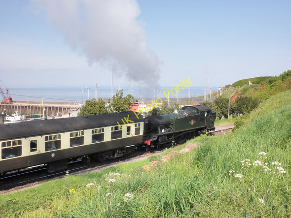 Photo 6"x4" Steam train passing Watchet harbour Watchet c2011