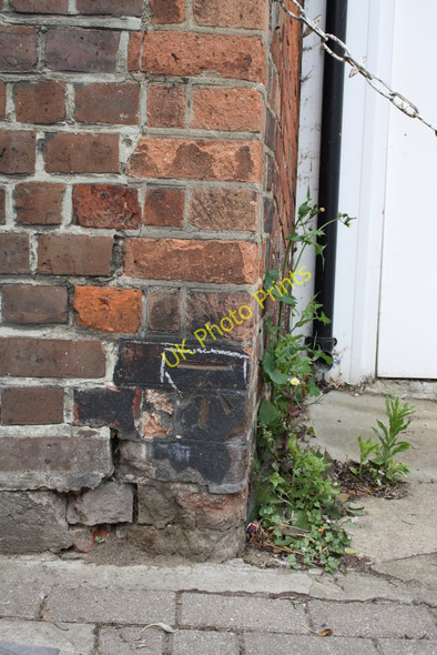 Photo 6"x4" Benchmark on wall end next to The Couture Gallery, Campden Street Kensington\/TQ2579 c2011